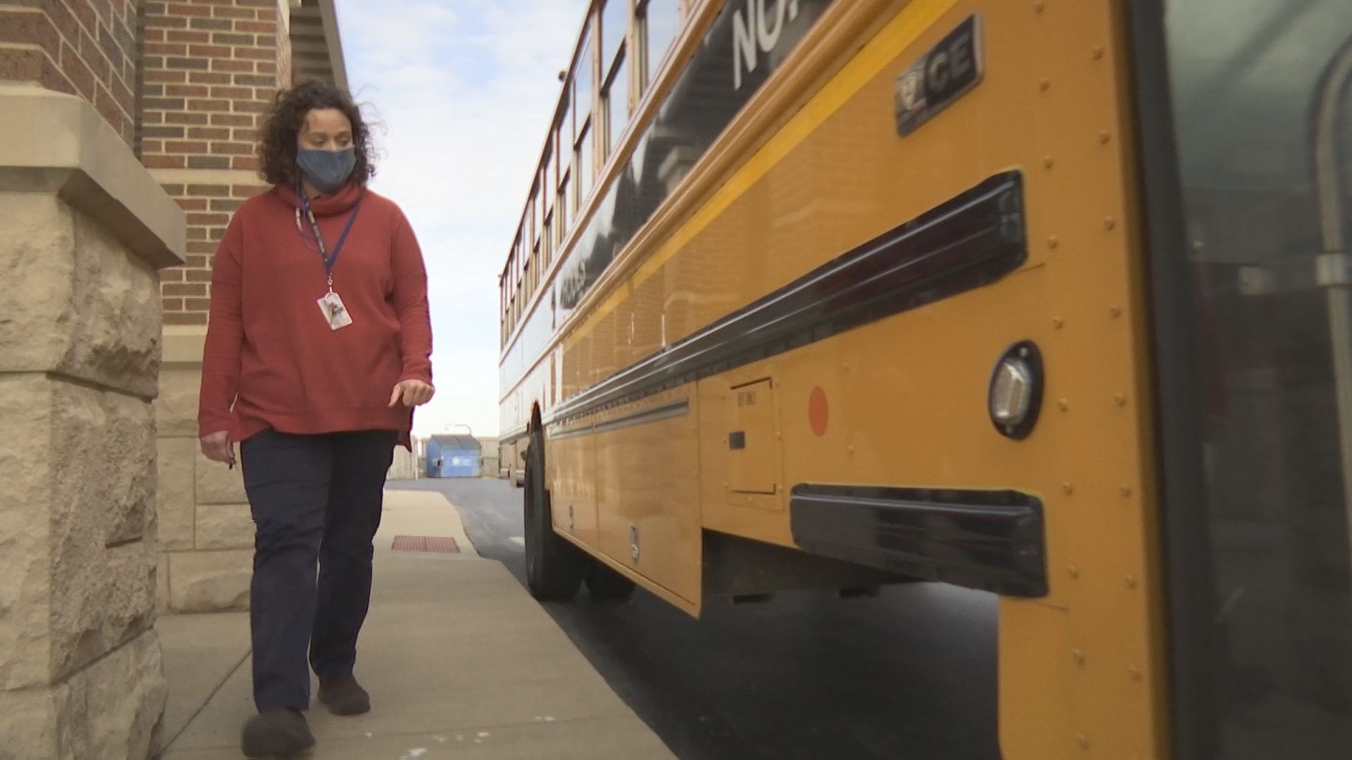 JANET INSPECTS BUS.jpg
